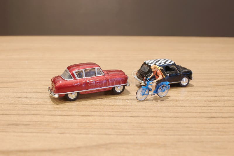 The Small Figure and Toy Car and Bike Stock Photo Image of figurine