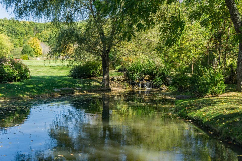Small Fish Pond and Waterfall royalty free stock photography Small Fish Pond and Waterfall royalty free stock photography