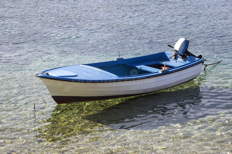 Small fishing boat on the sea in a summer day