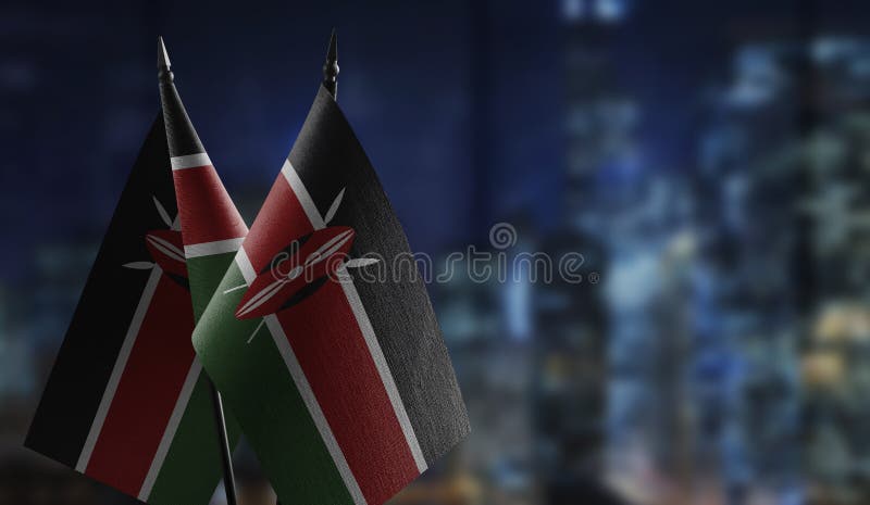 Small flags of the Kenya on an abstract blurry background stock illustration