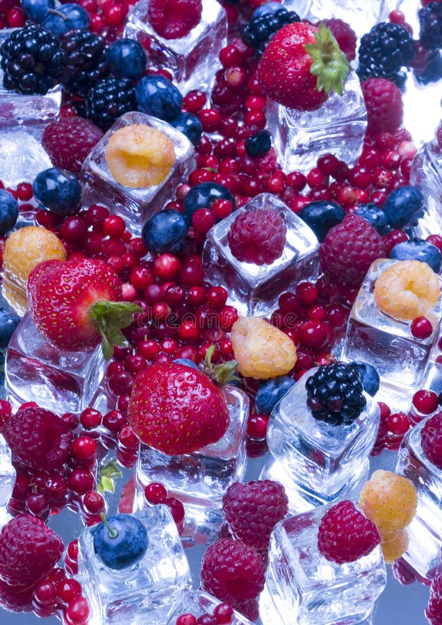 Small fruits among ice cubes