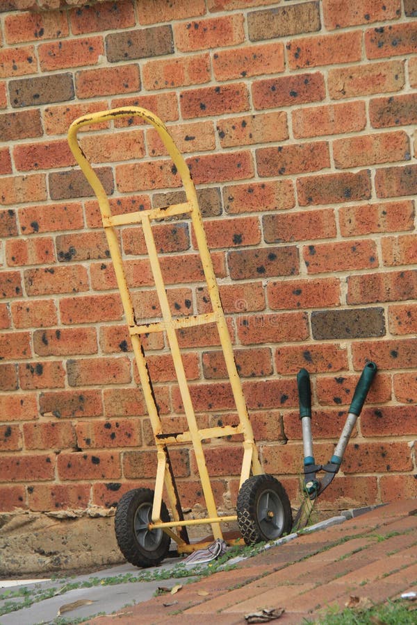 Small Gardening Cart Stock Photo Image Of Yellow Wall 74901390