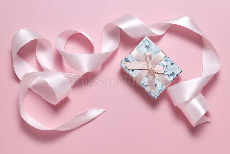 Small Gift Box with Bow and Pink Ribbon for Gift Wrapping on Pink  Background Stock Photo - Image of anniversary, isolated: 224928850