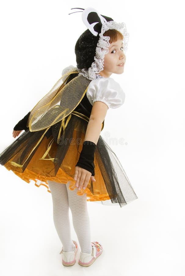 Small girl is bee costume