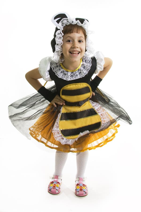 Small girl is bee costume.