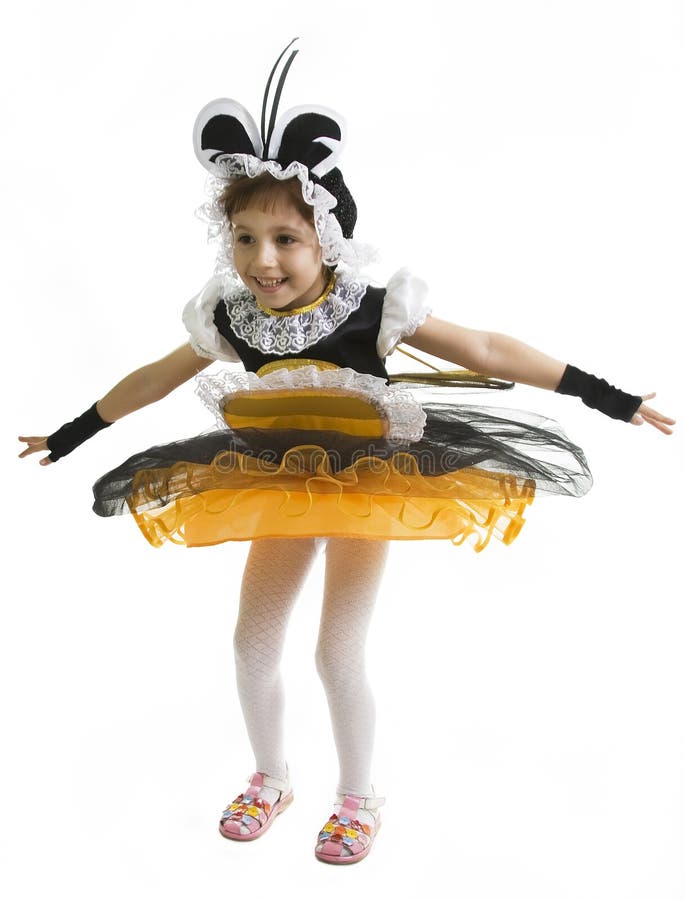 Small girl is bee costume. Flying bee.