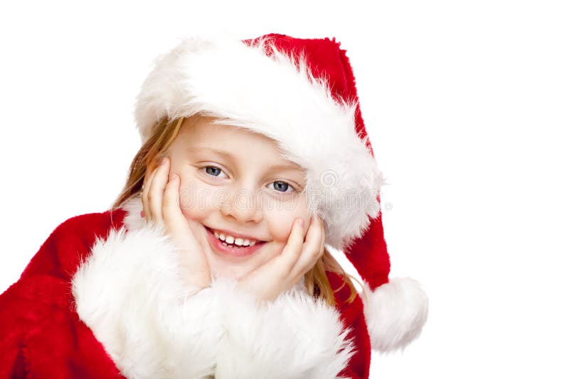 Small girl dressed as santa claus smiles happy