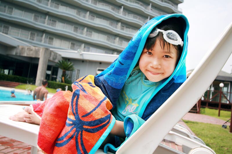 Small girl near the pool