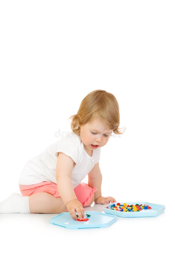 Small girl with toy mosaic isolated stock image