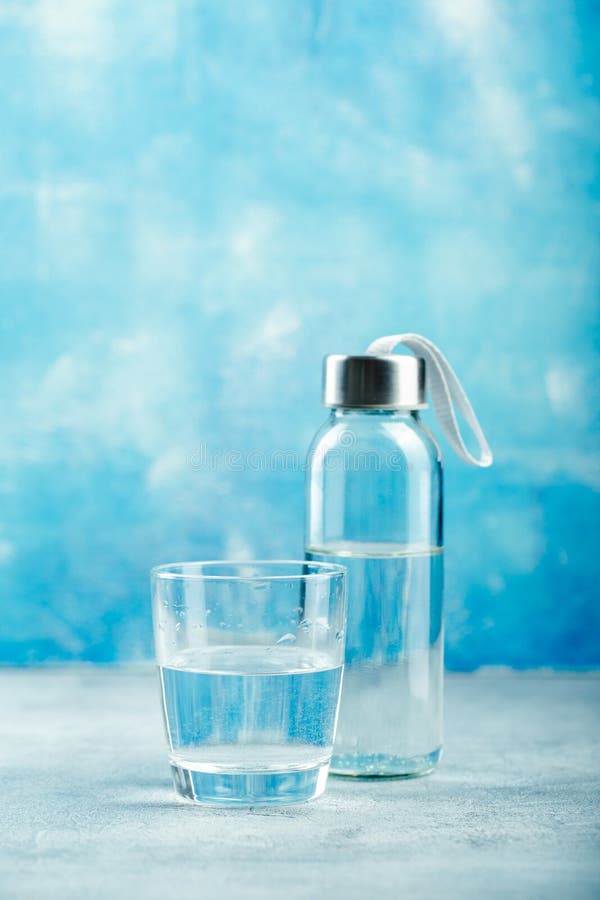 Small glass water bottle stock image. Image of object 144920611