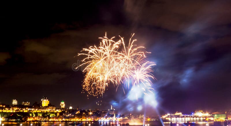 Small golden fireworks in front of Quebec City royalty free stock photography Small golden fireworks in front of Quebec City royalty free stock photography
