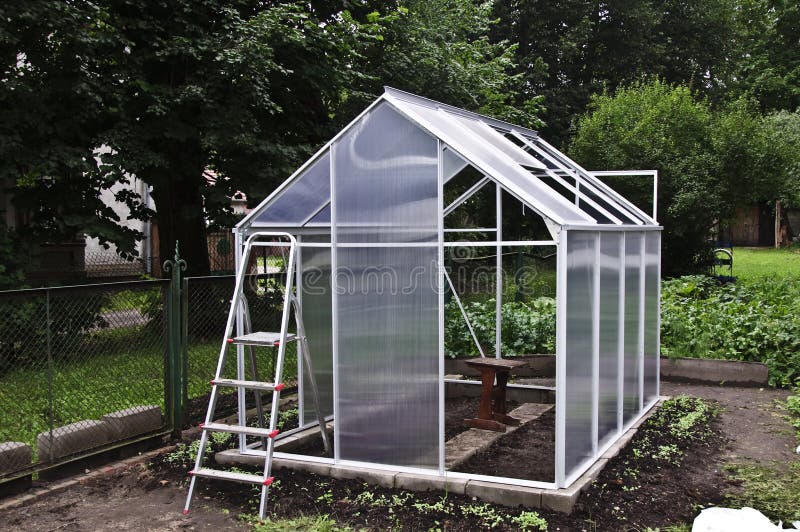Small greenhouse stock photos Small greenhouse stock photos