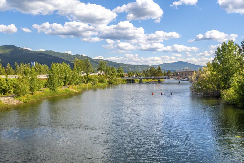 A group of kayakers enjoy a beautiful summer day on Sand Creek River and Lake Pend Oreille, Sandpoint Idaho. A small group of kayakers enjoy a beautiful summer stock photos A group of kayakers enjoy a beautiful summer day on Sand Creek River and Lake Pend Oreille, Sandpoint Idaho. A small group of kayakers enjoy a beautiful summer stock photos