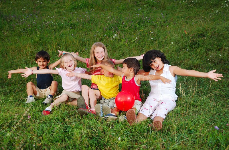 Small happy little group of children outdoor royalty free stock photography