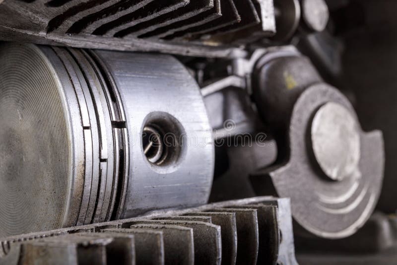 A Small Internal Combustion Engine Shown in Section. View of the Piston