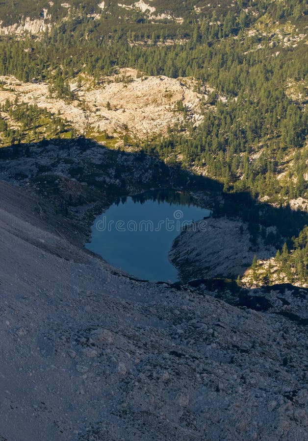Small lake at Seven lake valley, Bohinj covered in shadow royalty free stock images Small lake at Seven lake valley, Bohinj covered in shadow royalty free stock images