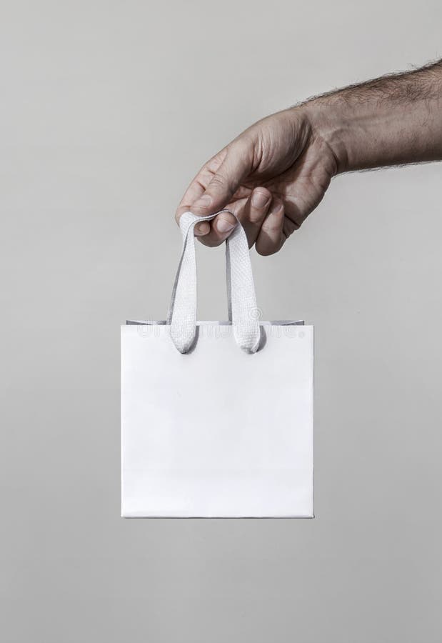 Small Luxury White Paper with Hand Stock Photo - Image of shopper, object: 198352274
