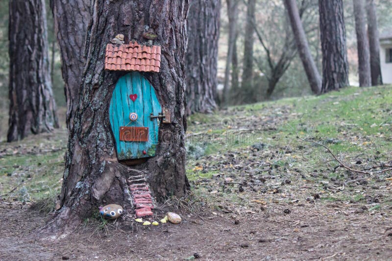Small magical garden of the gnomes in the forest stock image
