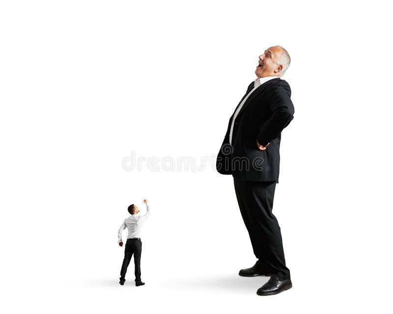 Small man showing fist to big businessman