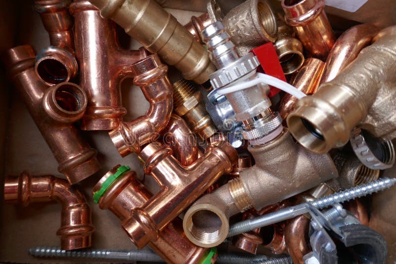 Plumbers copper fittings stock photo. Image of elbow 12100658