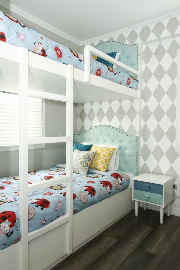 Small, Modern Children`s Bedroom with Bunk Beds and Checkered Wallpaper