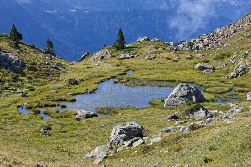 Small mountain pond in Belledonne moutain range royalty free stock image