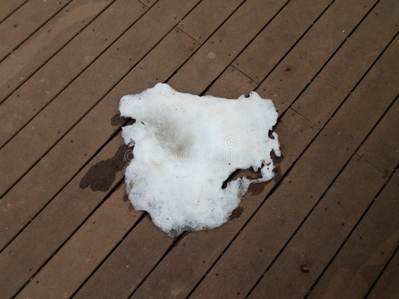 Small Pile of Melting Snow on Wood Deck in Winter Stock Image Image