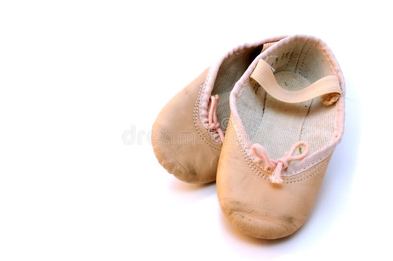 Small pink ballet shoes royalty free stock photo