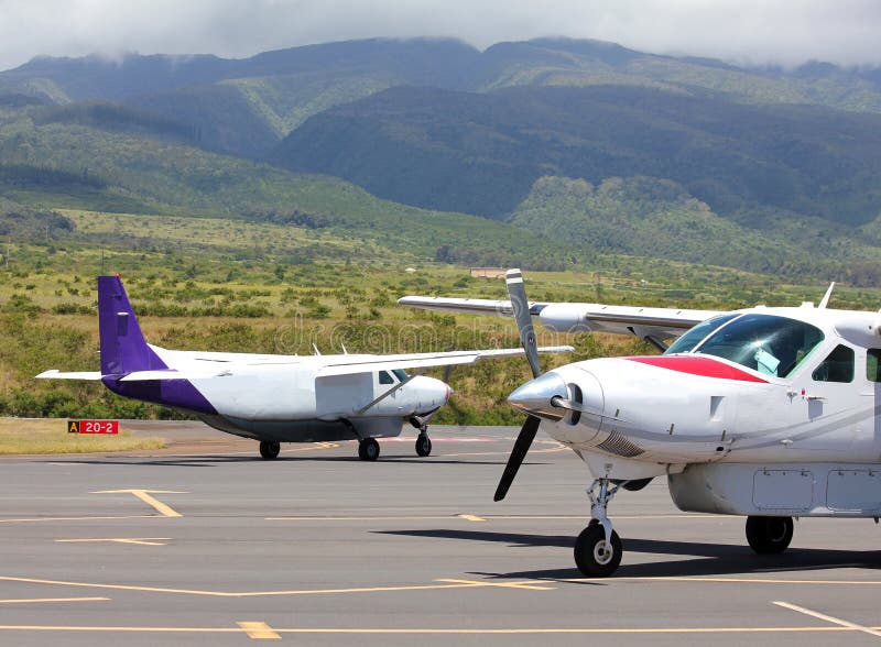 Small planes at exotic airport royalty free stock images Small planes at exotic airport royalty free stock images