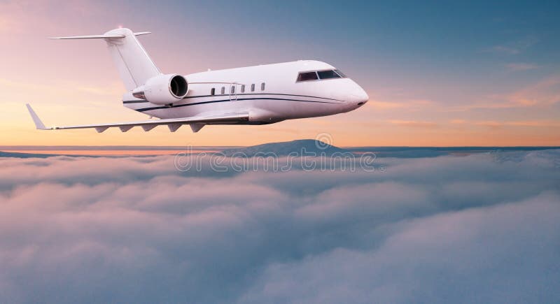 Small private jetplane flying above beautiful clouds.