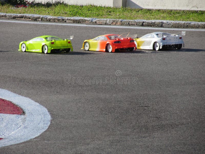 Small Radio Controlled Model Cars on the Track . Miniature Remote  Controlled Sport Racing Cars Hobby Stock Image - Image of racing,  competition: 117150903