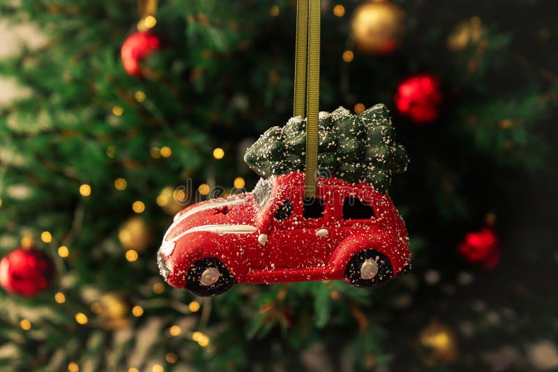 Christmas toy red car on a New Year tree. Christmas composition stock images Christmas toy red car on a New Year tree. Christmas composition stock images