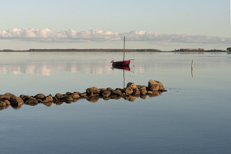 Small Sailboat at the Coast