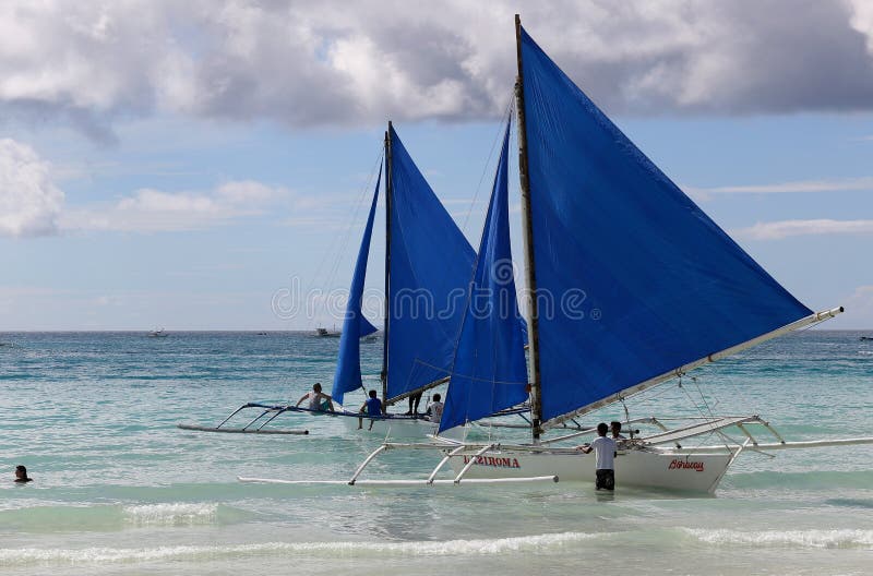 Small Sailing Boats at the Sunset. Boracay, Philippines Stock Photo