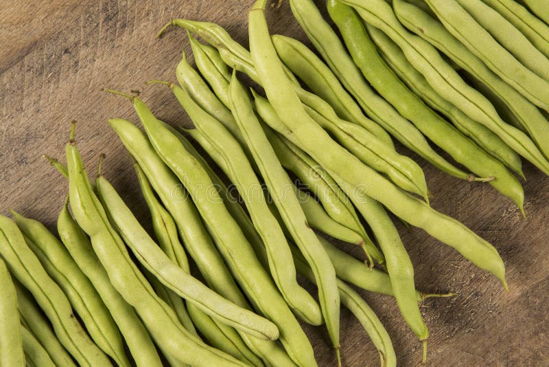 Small and Slender Green Beans (haricot Vert) on a Wood Stock Photo ...