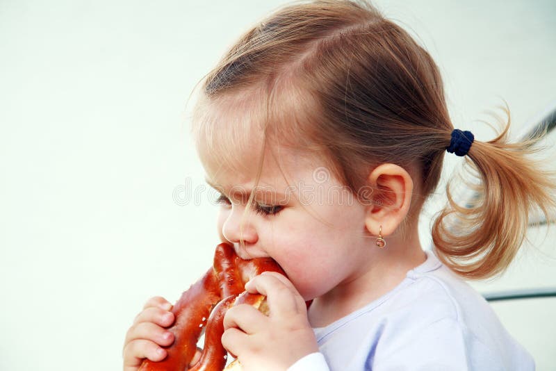 455 Girl Eating Pretzel Stock Photos Free & RoyaltyFree Stock Photos