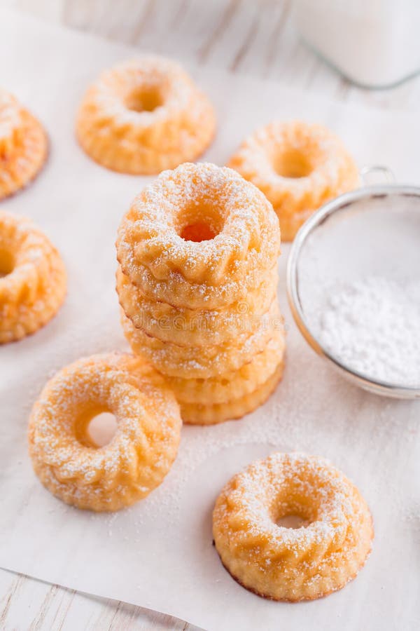Small Sponge Cakes with Cottage Cheese. Ring Cakes on White Background