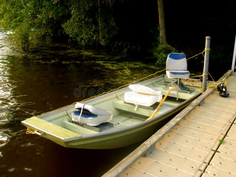small sport fishing boat in lake stock image - image of