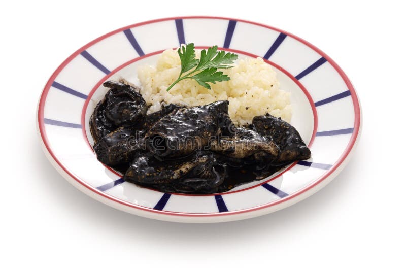 Small squid cooked in black ink, spanish basque cuisine