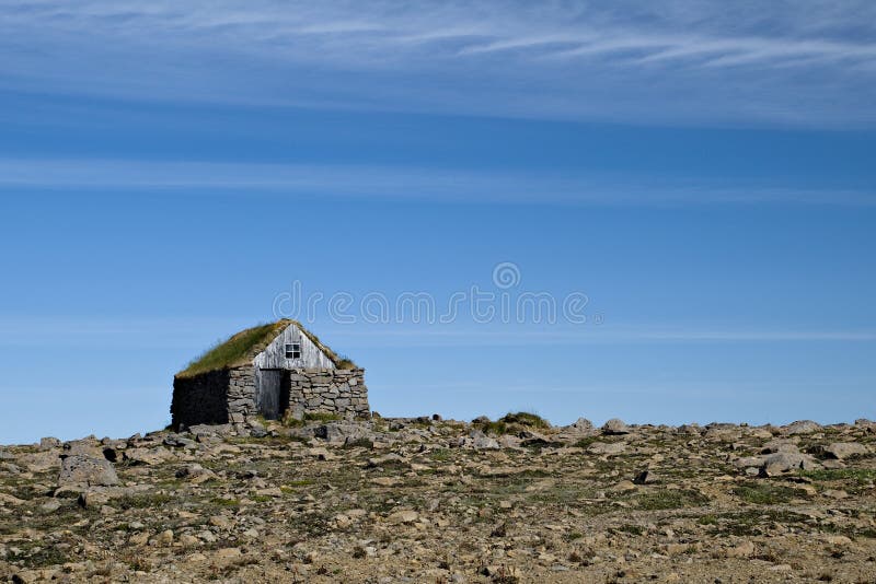 Small stone cottage royalty free stock image