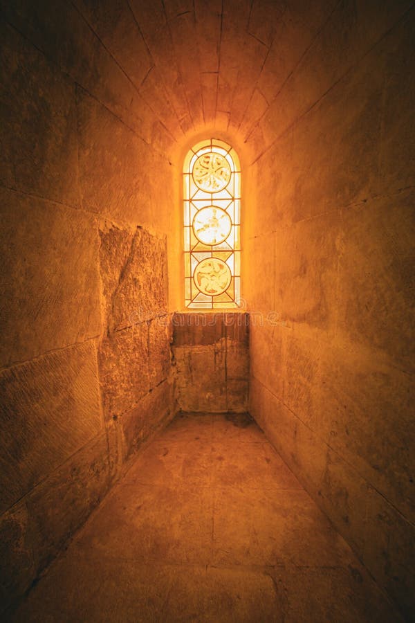 Small stone window and light royalty free stock image