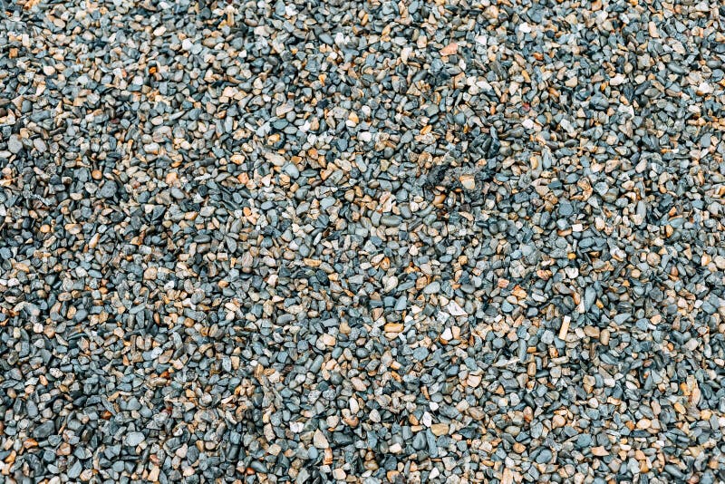 Small stones background blue and yellow stock photo Small stones background blue and yellow stock photo