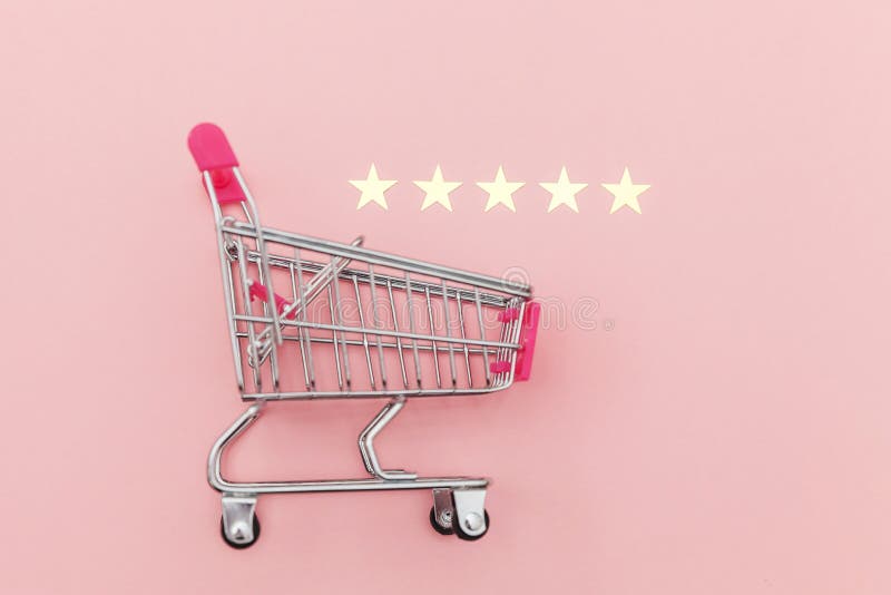 Small supermarket grocery push cart for shopping toy with wheels and 5 stars rating isolated on pastel pink background