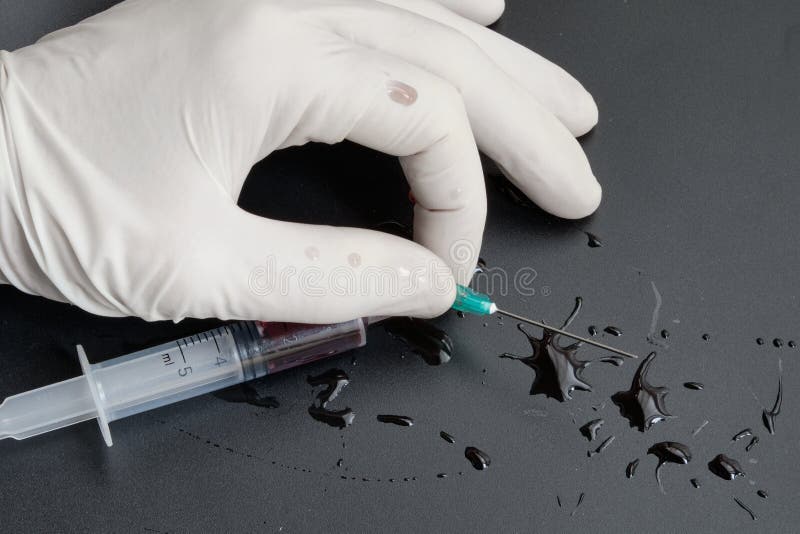 A Small Syringe into Which a Hollow, Sharppointed Bevelcut Needle is