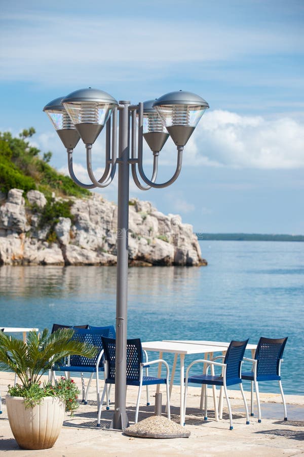 Small terrace facing a sea royalty free stock images