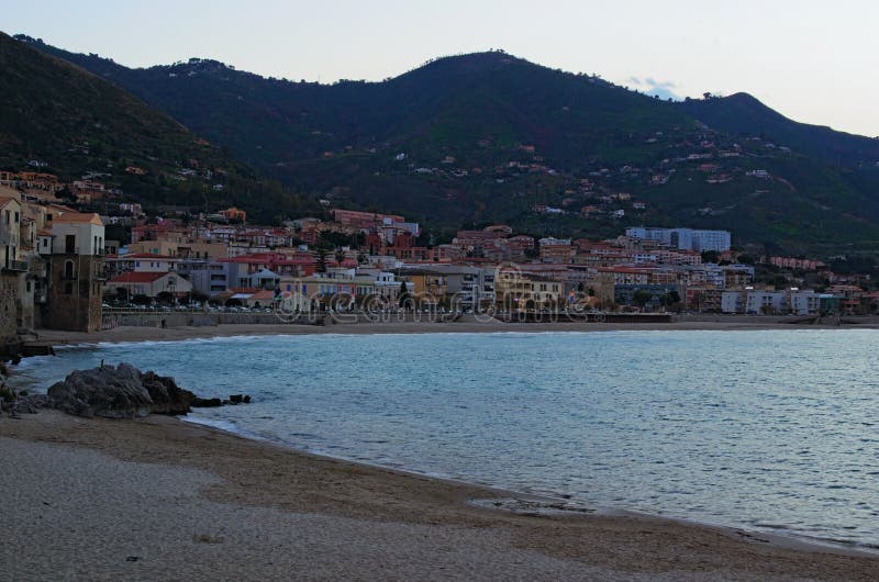 A Small Town on the Shore of the Sea. Cefalu is Located between Sea and ...