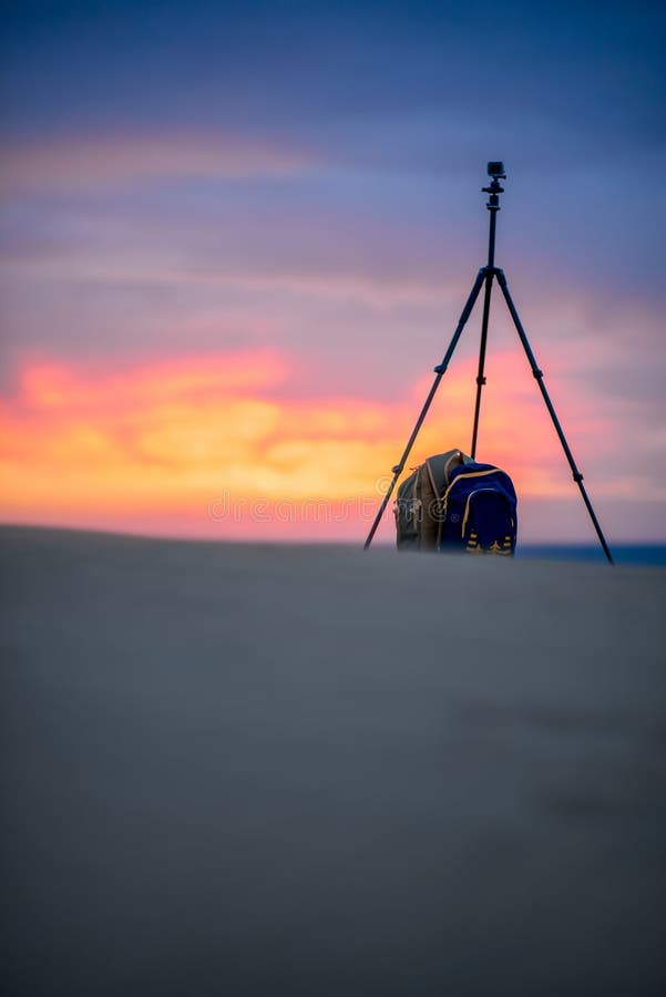 Small Video Camera on the Tripod with Backpack Stock Photo Image of
