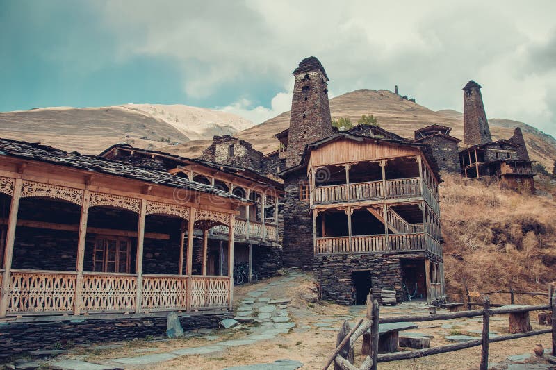 Small village Dartlo with traditional stone buildings and defensive towers in Tusheti. Adventure holiday. Travel to Georgia. Green royalty free stock photography Small village Dartlo with traditional stone buildings and defensive towers in Tusheti. Adventure holiday. Travel to Georgia. Green royalty free stock photography