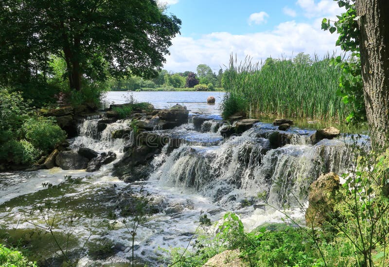 Small Waterfall on the River Eden in the Kent Countryside Stock Image