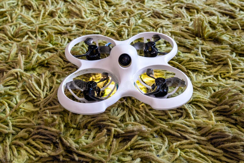 Small white indoor home brushless fpv quadcopter. Indoor home brushless stock images, royalty-free photos and pictures